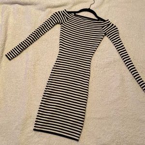 Form fitting off the shoulders mini dress